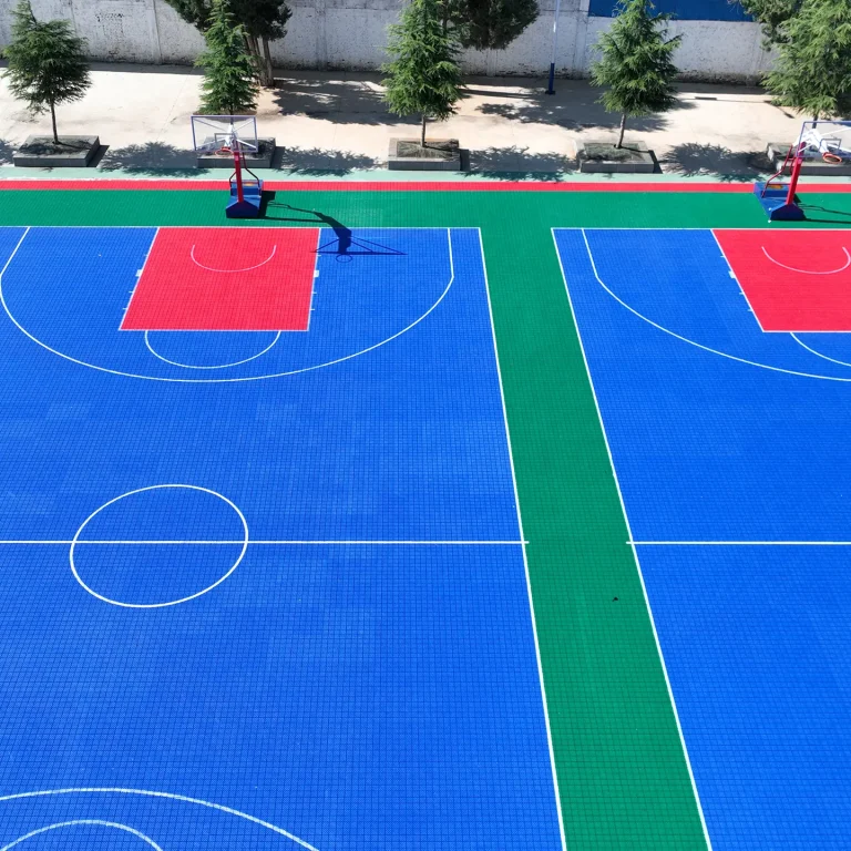 Completed outdoor basketball court with interlocking sports floor tiles