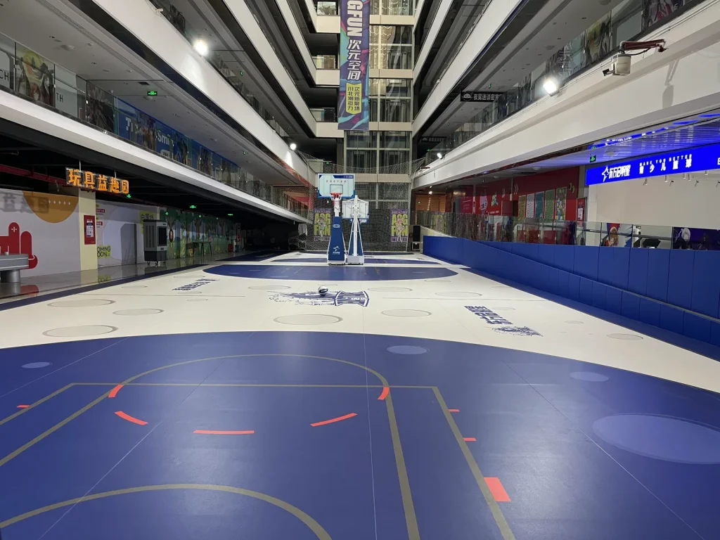 Blue and cream indoor basketball court