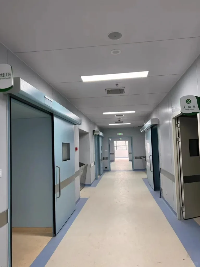 Corridor adjoining enclosed support rooms