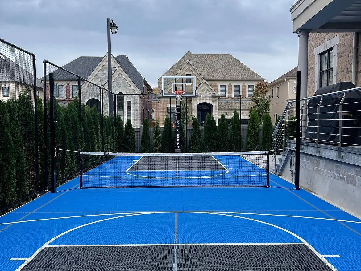 Backyard court with a basketball hoop and net