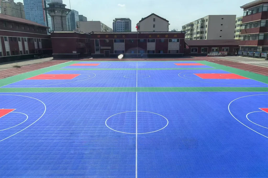 Outdoor school court with multiple playing markings