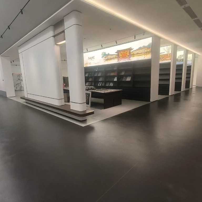 Open support interior with continuous dark flooring